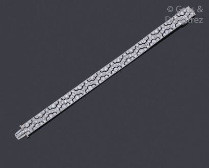 attribué à CHAUMET Soft white gold and platinum gold bracelet, adorned with stylized...