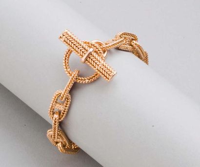 HERMES Paris Bracelet «Châine d'ancre tressé» en or jaune, fermeture batonnet. P...