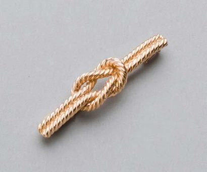 HERMES Paris N°64162 Broche barette en or jaune tressé agrémentée d'un noeud coulant....