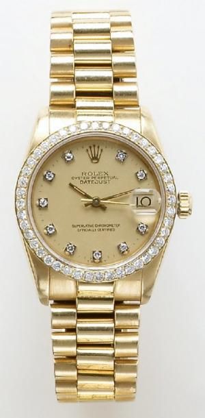 ROLEX « Oyster Perpetual Date Just » - Bracelet montre de dame en or jaune. Cadran...