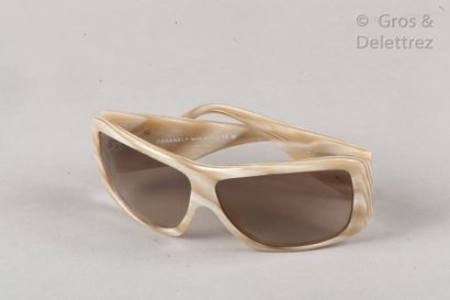 CHANEL Pair of resin sunglasses with imitation blond horn, signed temples, sunglasses....