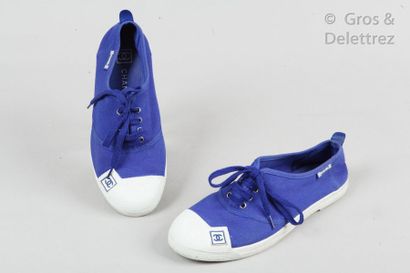 CHANEL *Pair of tennis shoes laced in electric blue canvas and white rubber, rubber...