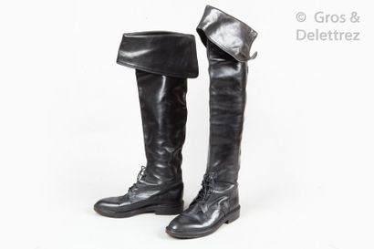 CHANEL *Pair of black calfskin lace-up riding boots, musketeer cuff, front stitched...