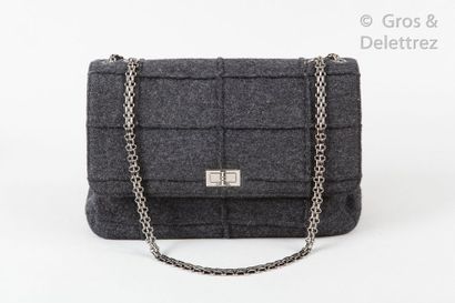 CHANEL identification Circa 1998

*Bag " 2.55 " 30cm in grey mottled checked wool,...