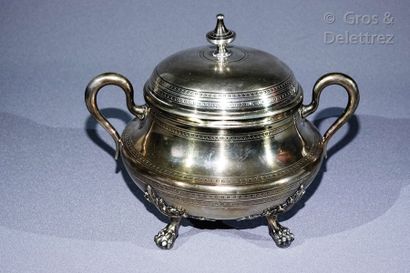 null Large silver covered sugar bowl with four legs with leafy staples.

After 1838...