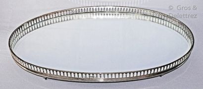 null Oval centerpiece in silver plated metal with an openwork gallery, the back of...