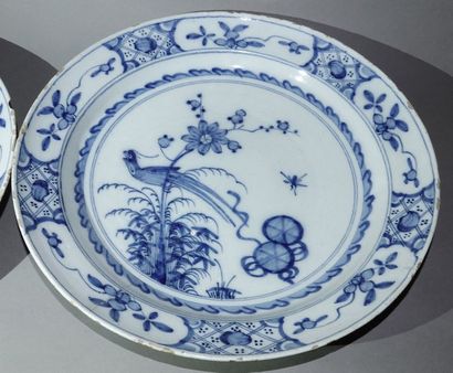 DELFT Pair of circular earthenware dishes with blue monochrome decoration in the...