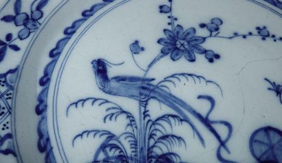 DELFT Pair of circular earthenware dishes with blue monochrome decoration in the...