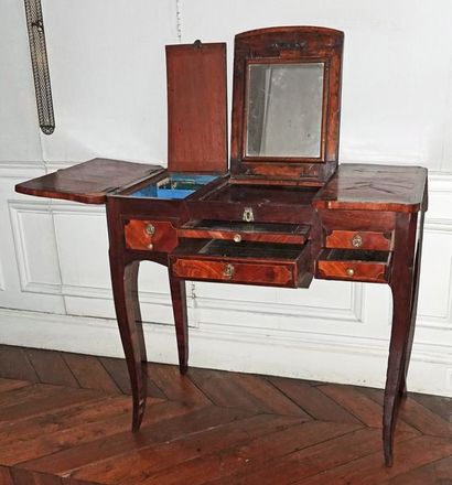 null Dressing table in violet wood veneer and rosewood inlaid with leaves in reserves,...