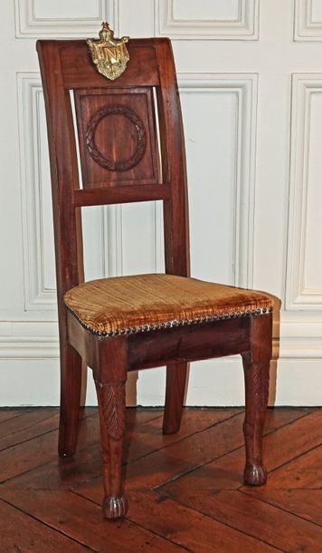 null Small straight chair in moulded and carved wood, the back with a board decorated...