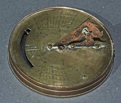 null Pocket sundial, round shaped, made of copper and brass. Foldable triangular...