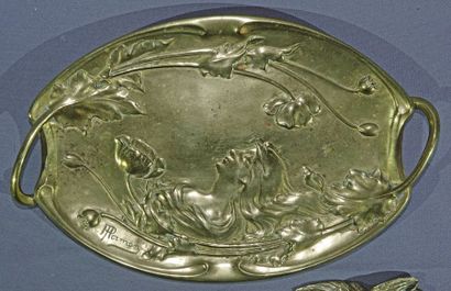 null Brass Art-Nouveau pocket-emptyer decorated in bas-relief with a woman and flowered...