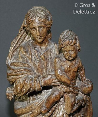 null Statuette de Vierge à l'Enfant en bois tendre sculpté. XVIIIème siècle (décapée,...