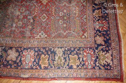 null Important carpet with stylized polychrome floral decoration on a coral background,...