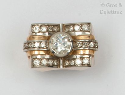 null Tank" ring in yellow gold and platinum, set with a half-cut diamond in closed...