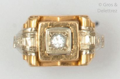 null Yellow gold and white gold bridge ring, set with a brilliant-cut diamond with...