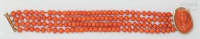 Bracelet composed of four rows of coral beads....