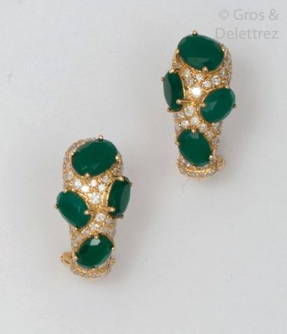 null Pair of yellow gold earrings, each adorned with brilliant-cut diamonds and cabochons...