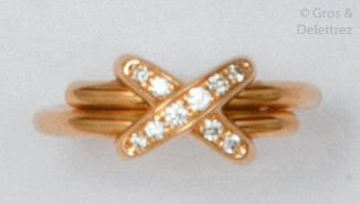 CHAUMET " Lien " - Yellow gold ring, the clasps set with brilliant-cut diamonds....