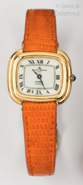 BAUME ET MERCIER pour HERMES Ladies' wristwatch in yellow gold with gadroon decoration,...