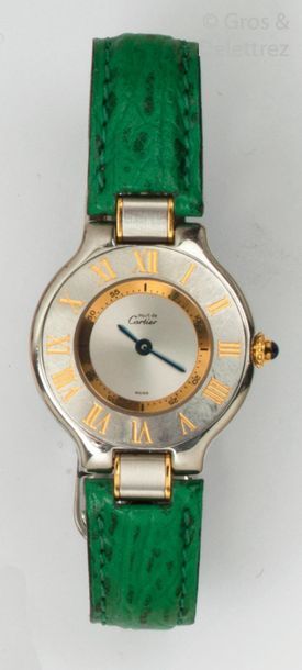 CARTIER " Must " - Ladies' wristwatch in steel and gold-plated metal, round case,...