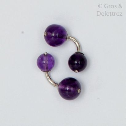 null Pair of white gold cufflinks, each adorned with a ball of amethysts set with...