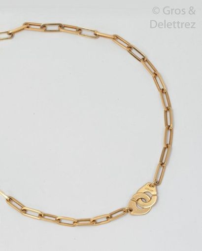 DINH VAN Yellow gold necklace with oblong links, handcuff clasp. Signed Dinh Van....