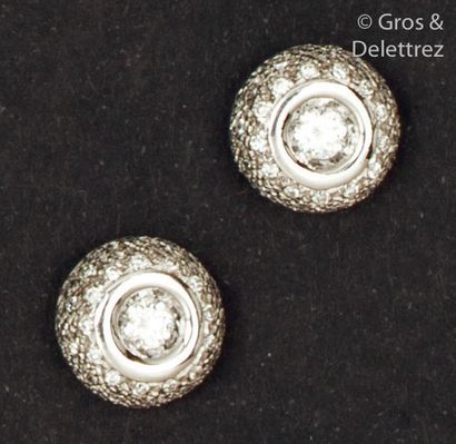 null Pair of white gold " Dôme " earrings, adorned with a brilliant-cut diamond....