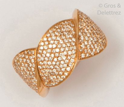 null Ring " Jonc " in pink gold, decorated with shuttles some set with brilliant-cut...