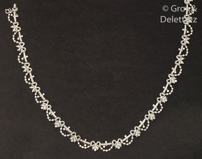 null Necklace " Draperie " in white gold decorated with knots and friezes paved with...