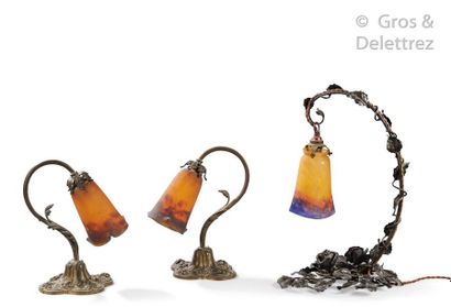 MULLER FRERES Pair of lamps with a bronze plant base enclosing a tulip in marbled...