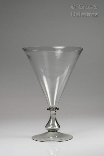 Glass with large conical cut on baluster...
