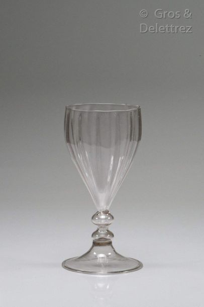Ribbed floral glass on hollow leg with double...