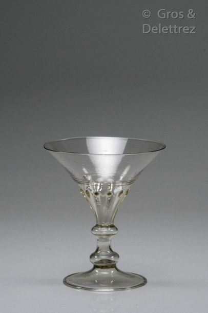 Conical cut glass decorated with ribs in...