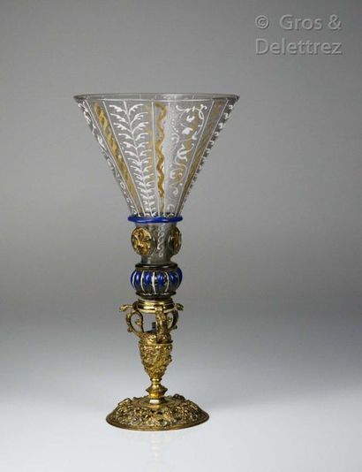 null Very rare conical bowl glass resting on a blue and white enamelled gadrooned...