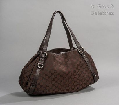 GUCCI Bag "Abbey" 38cm in canvas signed GG Supreme cocoa and leather to the color,...