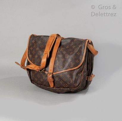 LOUIS VUITTON Bag "Saumur" 33cm in Monogram canvas and natural leather with two compartments,...