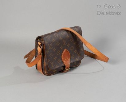 LOUIS VUITTON Bag "Cartouchière" MM 21cm in Monogram canvas and natural leather,...