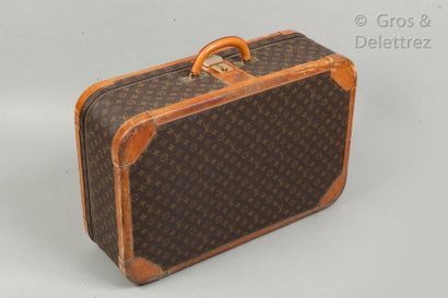 LOUIS VUITTON Suitcase in Monogram canvas and natural leather with E.M.C. number,...