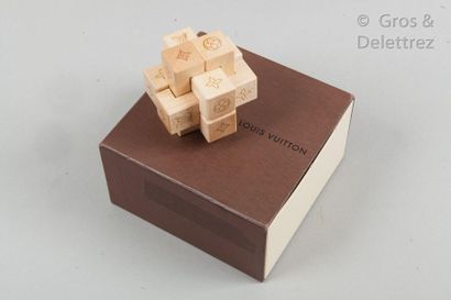 LOUIS VUITTON Wooden "Pateki" puzzle with the initials. Original box.