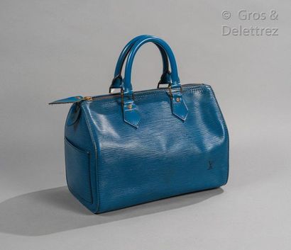 LOUIS VUITTON Sac "Speedy" 25cm en cuir épi bleu, fermeture éclair, double poignée,...