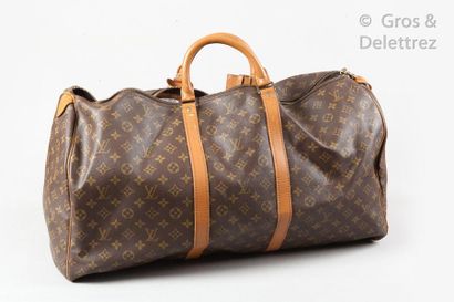 LOUIS VUITTON Keepall" bag 60cm in Monogram canvas and natural leather with the number...