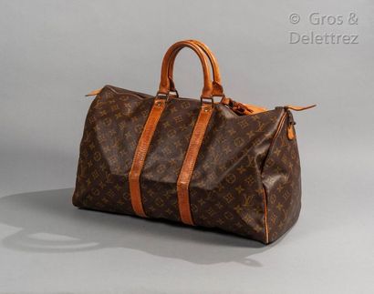LOUIS VUITTON Keepall" bag 45cm in Monogram canvas and natural leather, zipper, double...