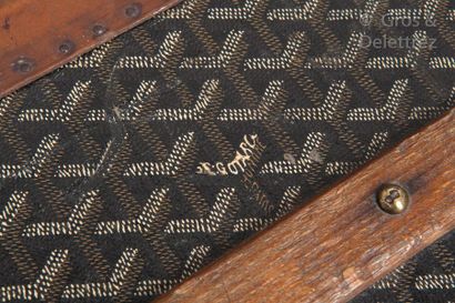 E. GOYARD AINE Mail trunk in black goyardine, leather borders, beech wood reinforcements,...
