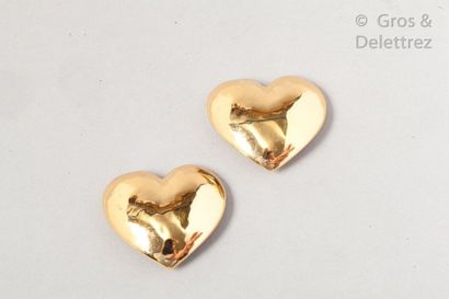 Yves Saint LAURENT Pair of gilded metal "Heart" ear clips. Signed.