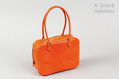 HERMÈS Paris made in France Year 2007 
? Feather" bag 20cm in fire orange Varanus...