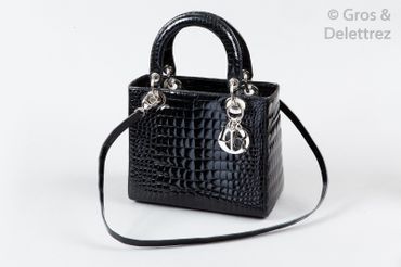 CHRISTIAN DIOR ? Lady Dior" bag 25 cm in shiny black crocodile leather, zipper, double...