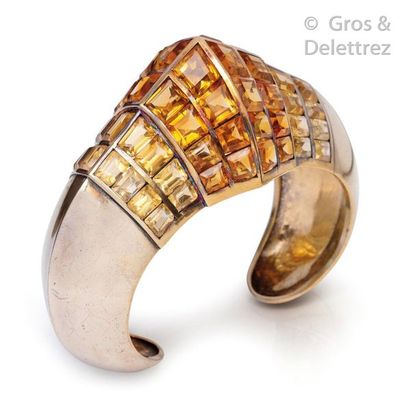 RENE BOIVIN A vermeil and yellow gold "open band" bracelet with a pyramidal design,...