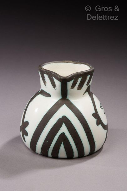 Pablo Picasso (1881-1973) Heads

White earthenware jug with polychrome decoration.

Signed...