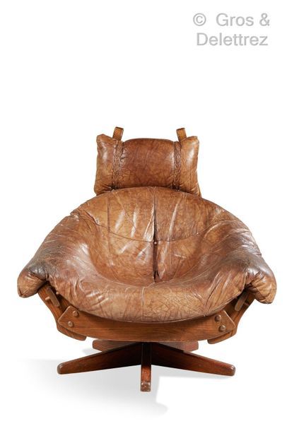 Jean GILLON, dans le goût de Armchair with rosewood structure. Seat and backrest...